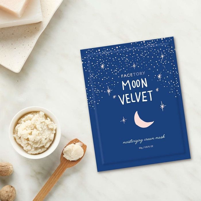 blue pouch with a moon design