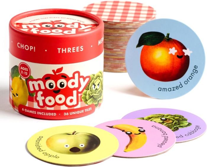 The Moody Food game packaging features a stack of illustrated emotion cards, each with a unique design.