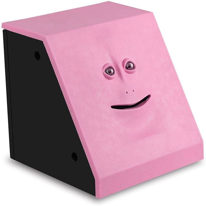 The pink piggy bank with its mouth shut