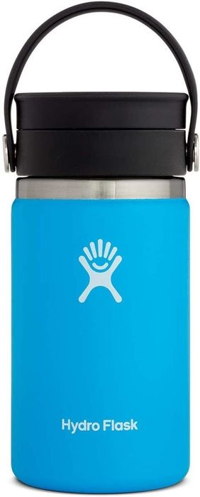 a bright blue travel mug with a strap attached to its screw-on lid