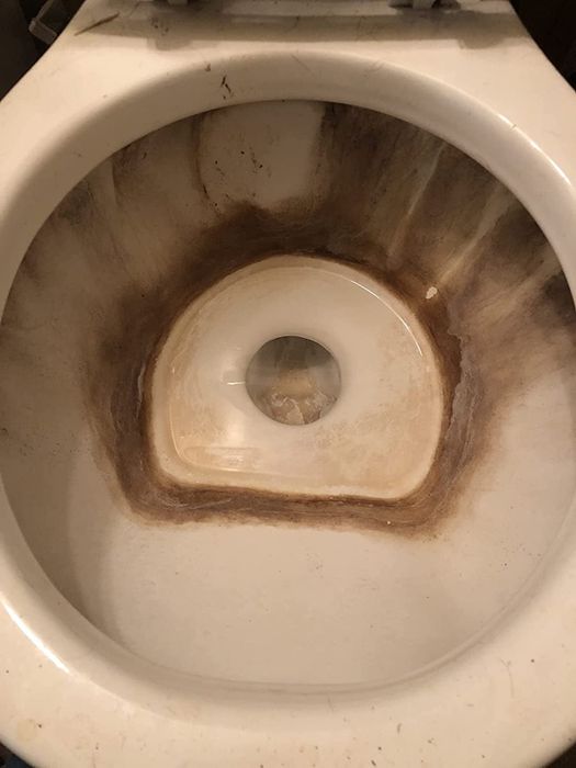 A reviewer's toilet bowl before using the pumice stone