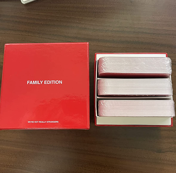 A red box filled with cards labeled