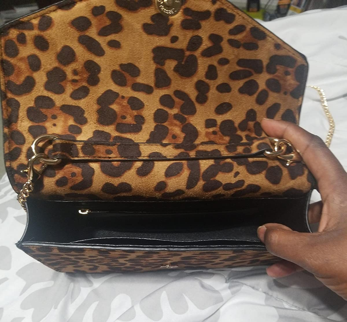 A close-up photo from the reviewer, highlighting the interior of the clutch.