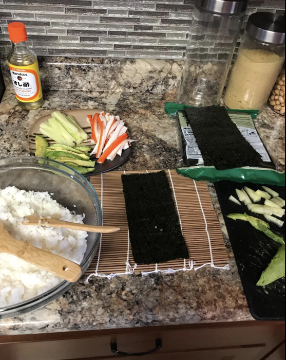 Reviewer image showing ingredients for sushi arranged with a sushi rolling mat.
