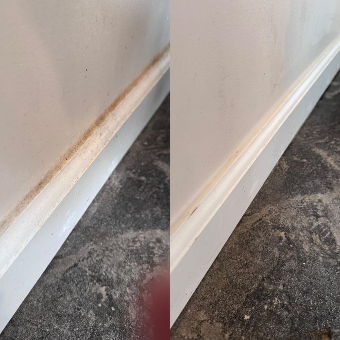 A reviewer's baseboards before and after using the spin scrubber