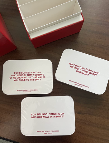 White cards featuring prompts designed for siblings.