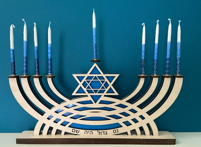 a menorah with lit candles