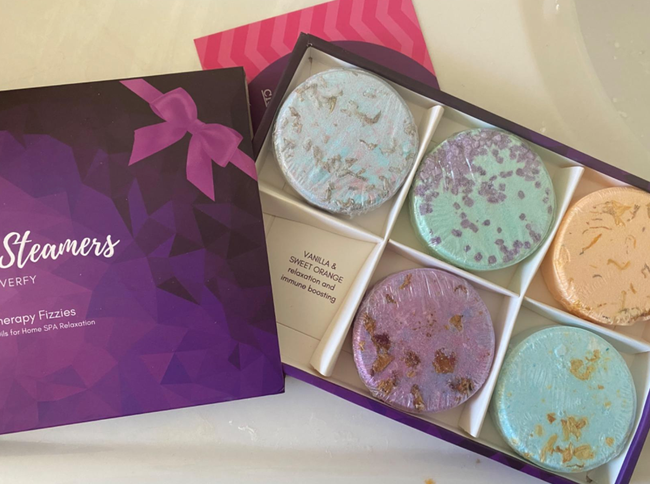 A photo from a reviewer showcasing the box of shower steamers.