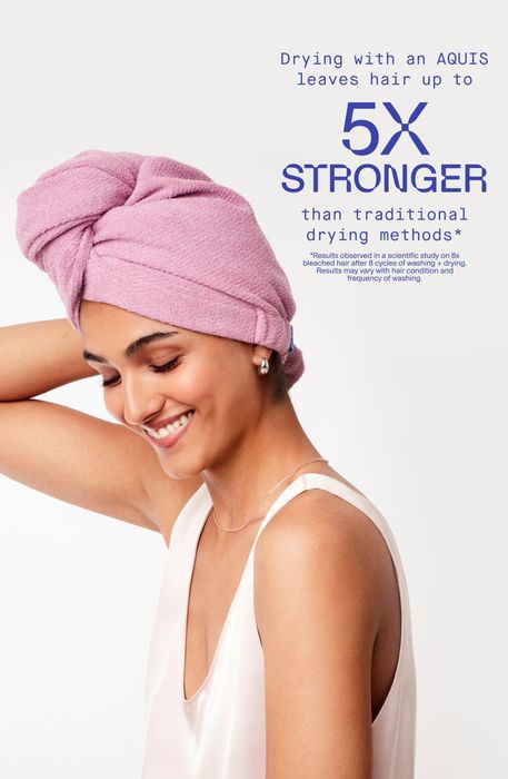 Model using the pink towel