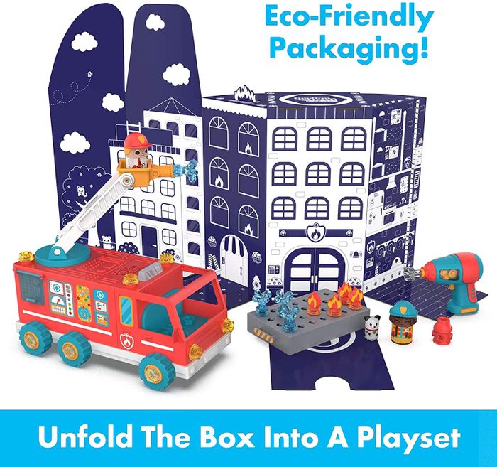 A fire truck toy with its cardboard packaging repurposed as a playset