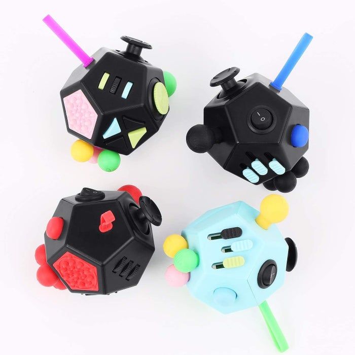 A set of four vibrant, multi-colored 12-sided fidget toys