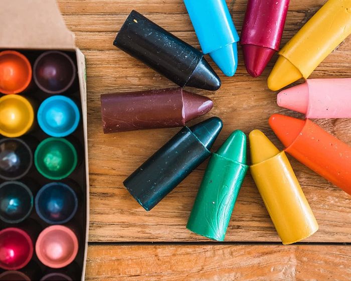 An overhead shot of vibrant, colorful crayons