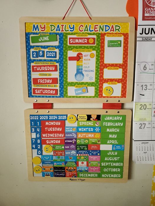 A reviewer's image showing a colorful children's calendar toy