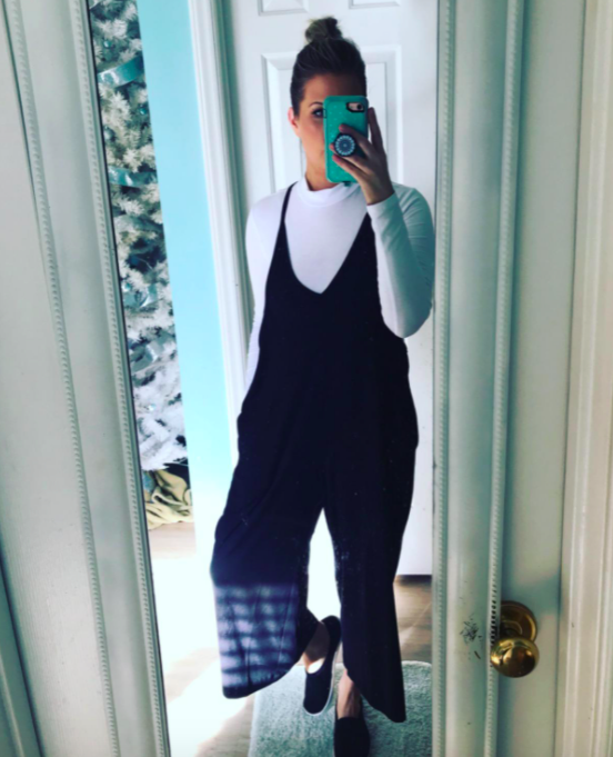 A customer review displaying them in the jumpsuit.