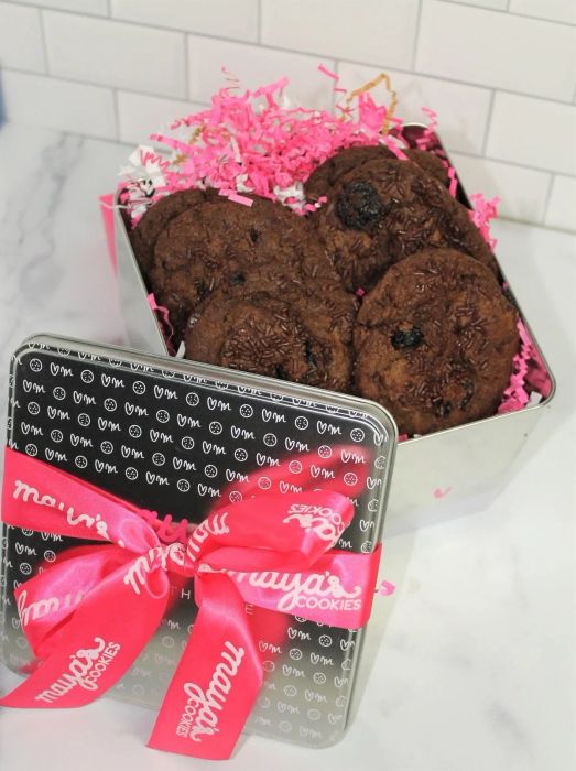 Silver tin of Chocolate Cherry Truffle cookies, elegantly topped with a pink ribbon