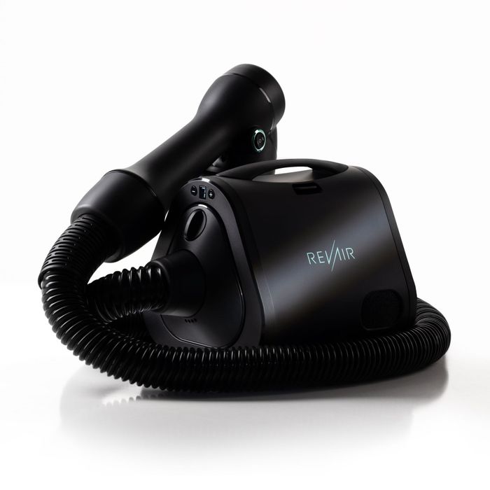The RevAir Reverse-Air Dryer is displayed on a clean white background, emphasizing its status as a top-tier haircare product available for purchase.
