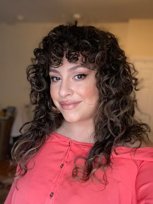 reviewers showcasing their curly hair transformation after using the mousse