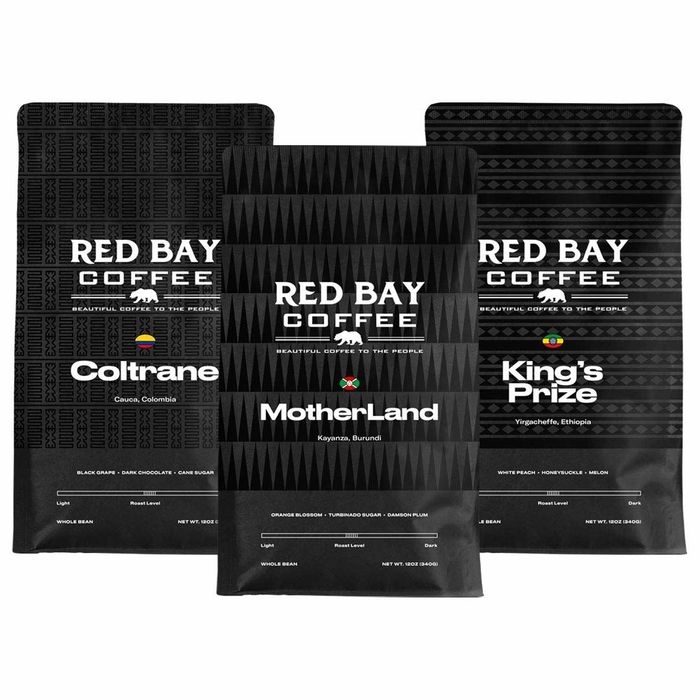 Three bags of premium coffee beans.