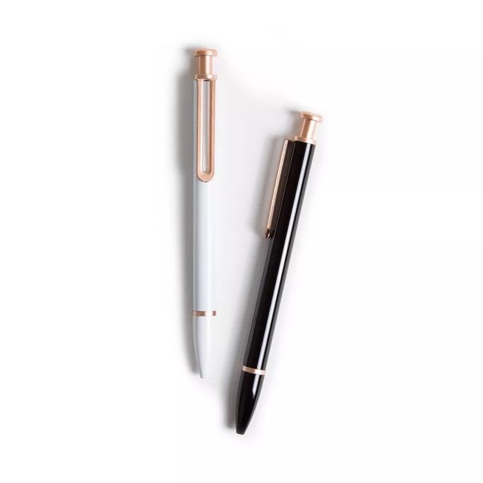 A sleek white and rose gold pen, paired with a chic black and rose gold pen, perfect for writing in style.