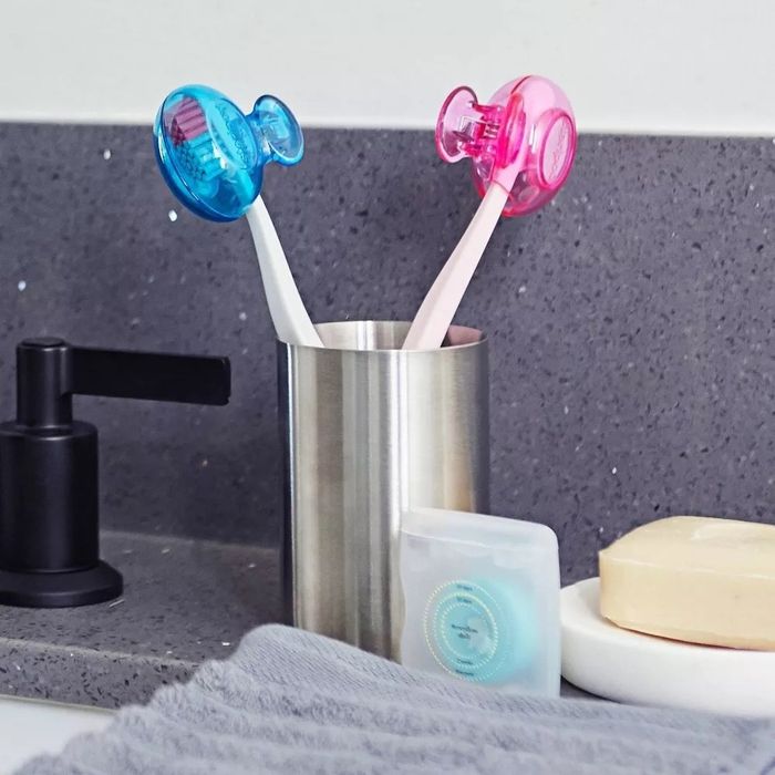 A pink and blue brush design over a brush.