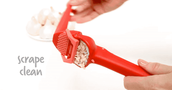 The scraper cleans the press, while the eject button removes the garlic peel.