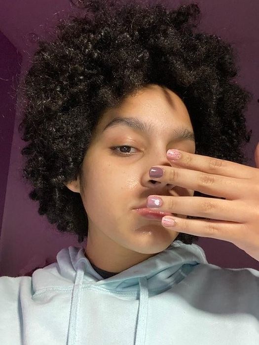 Reviewer's before photo showcasing naturally curly hair