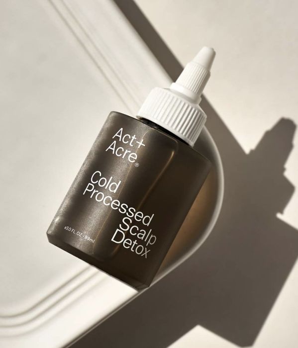 a flatlay image of the scalp detox product placed on a porcelain tray
