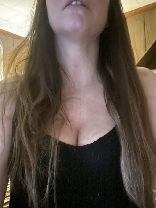 A side-by-side comparison showing one side of a person's hair frizzy and unbrushed, while the other side is smooth and brushed.