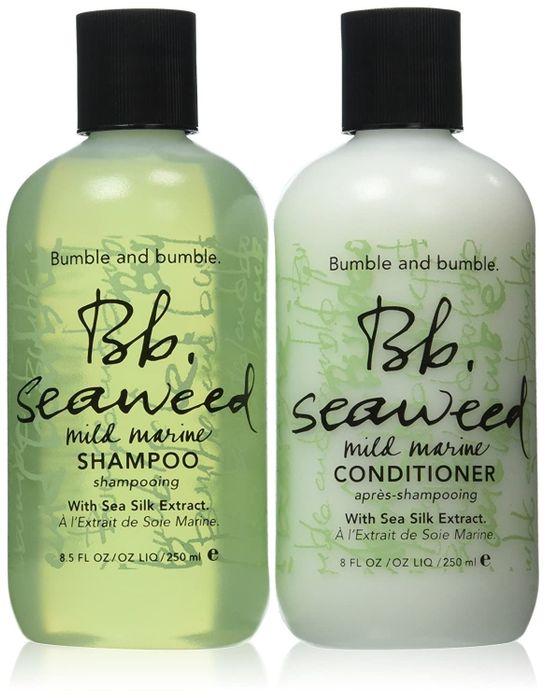a green-colored shampoo and conditioner set