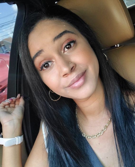 a person with pin-straight hair before trying the wave styler
