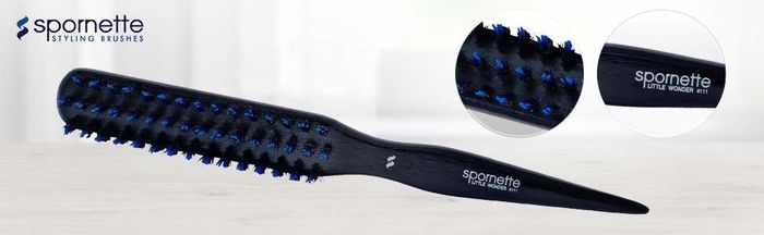 The teasing brush with a pointed end, perfect for sectioning your hair for a precise style.