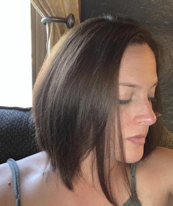 A person showcasing clean, refreshed hair after using the clarifying shampoo.