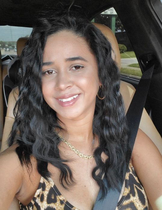 a person with soft, natural waves after using the wave styler