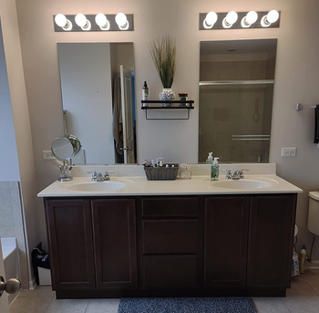 Reviewer before photo of their outdated bathroom vanity