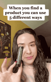 A model demonstrating the versatility of the matcha stick by using it in five different ways: as an eye moisturizer, brow gel, flyaway gel, dry spot treatment, and lip balm.
