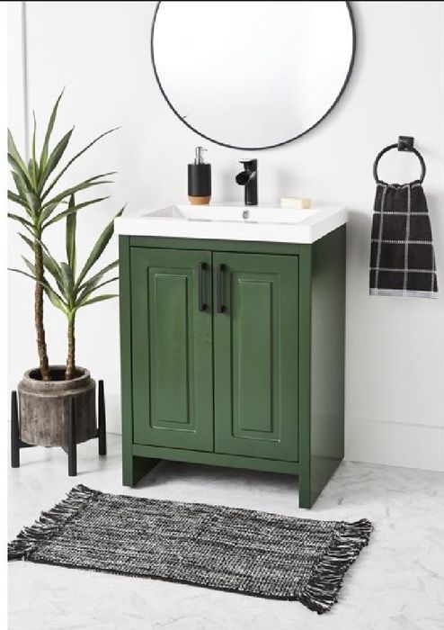 Green under-sink bathroom storage cabinets