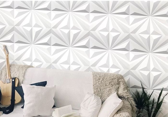 Textured wall tiles in white and various other designs