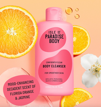 The signature pink bottle of the cleanser, standing out with its distinct hue.