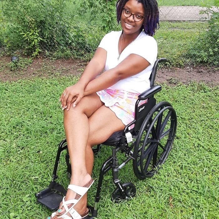 A reviewer showing off their soft, nourished skin after using the oil spray.