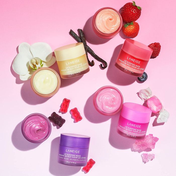 The different scents of Laneige lip sleeping mask, displayed in jars of various colors.