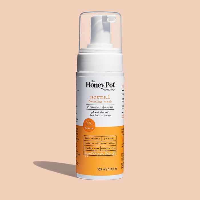 A bottle of normal wash in orange and white.