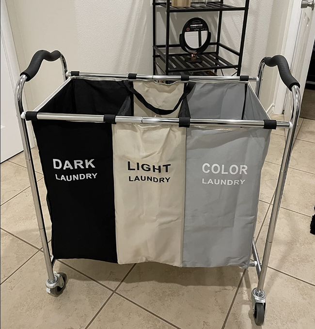 Image of a three-compartment rolling laundry hamper from a reviewer.