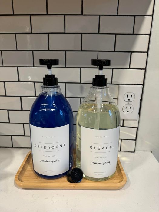 Two large pump bottles labeled.