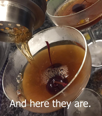 A close-up shot of drinks being poured, with the phrase 'Here they are' displayed.