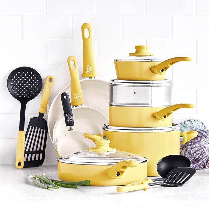 A yellow-colored pot set.