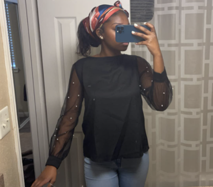 a photo from a reviewer showing the shirt in black