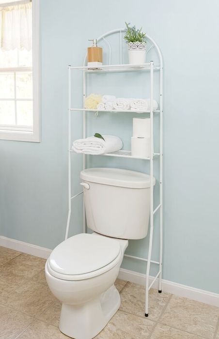 white metal storage unit with three shelves