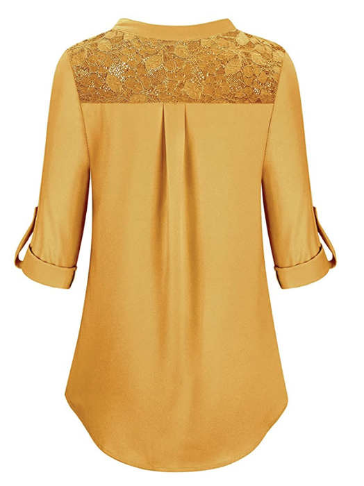 Revealing the back of the shirt to showcase its yellow lacy top