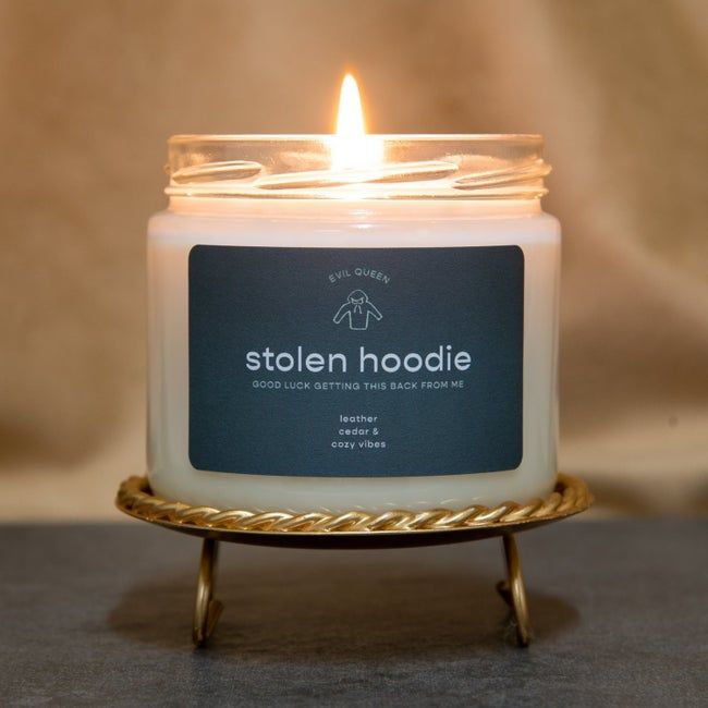 A candle with a label that reads