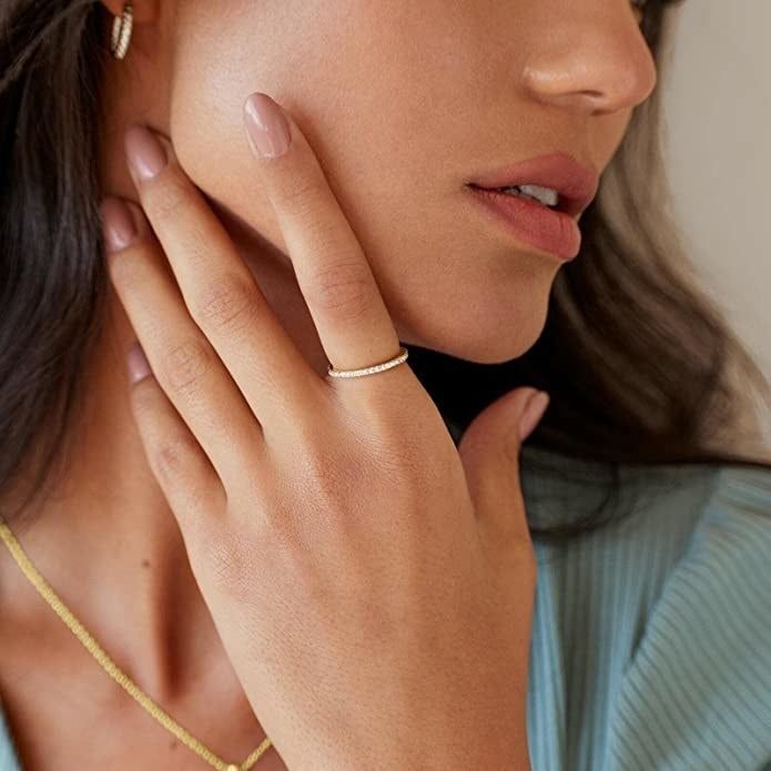 A model showcasing one of the rings.